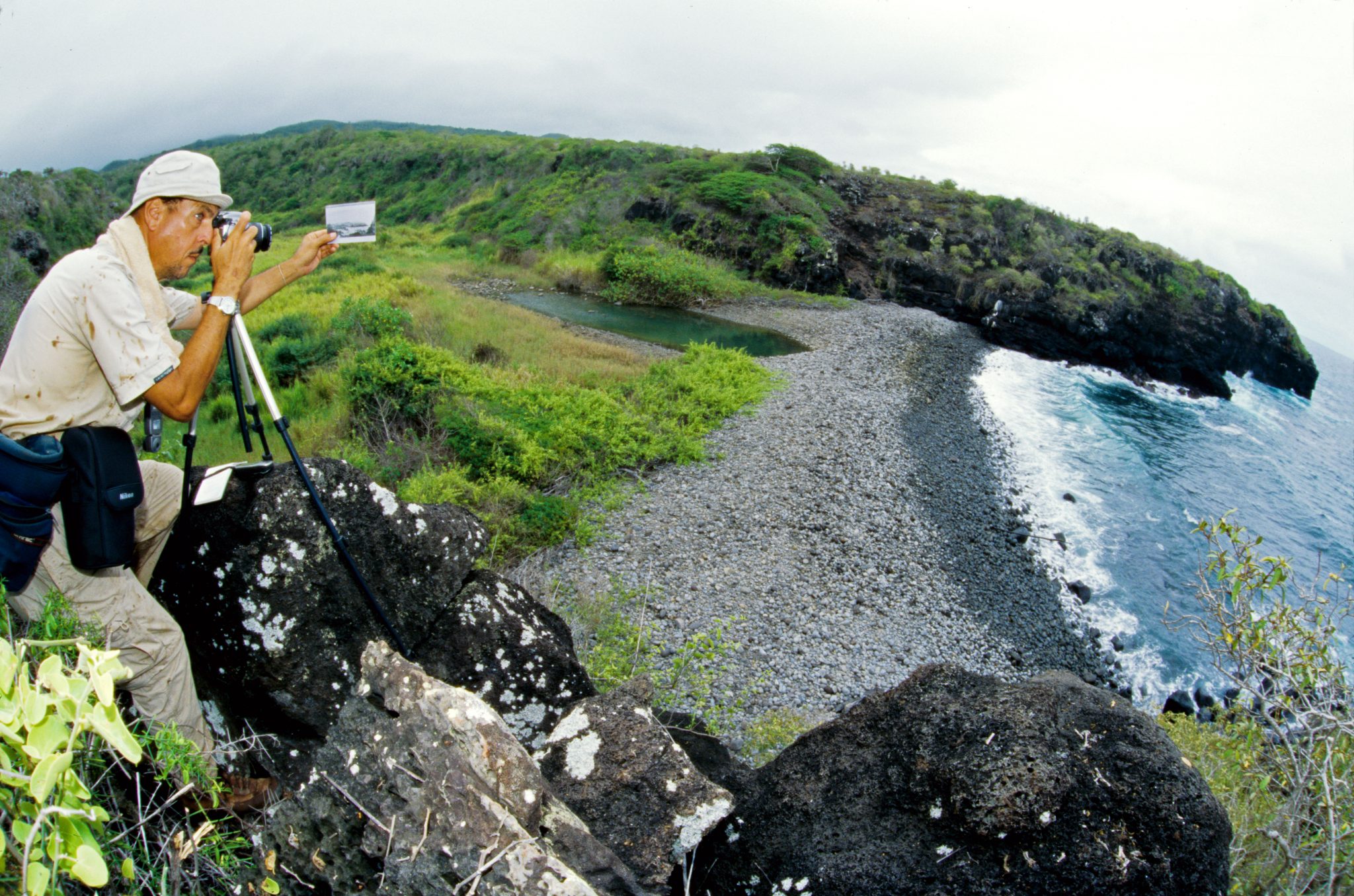 Freshwater Bay, on the southern side of San Cristóbal.  A sketch was made by a member of the Beagle crew in 1835 and was later published by Captain FitzRoy in his account of the Beagle voyage.  In this photo I am trying, as part of an ongoing study of ecological changes in the Galápagos, to photograph Freshwater Bay from the same location where the Beagle's artist stood in 1835.